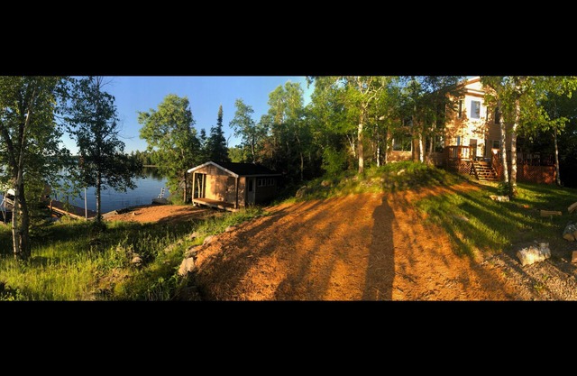 Lake cabin on 5 acres and 780' of shoreline on an island with panoramic views.