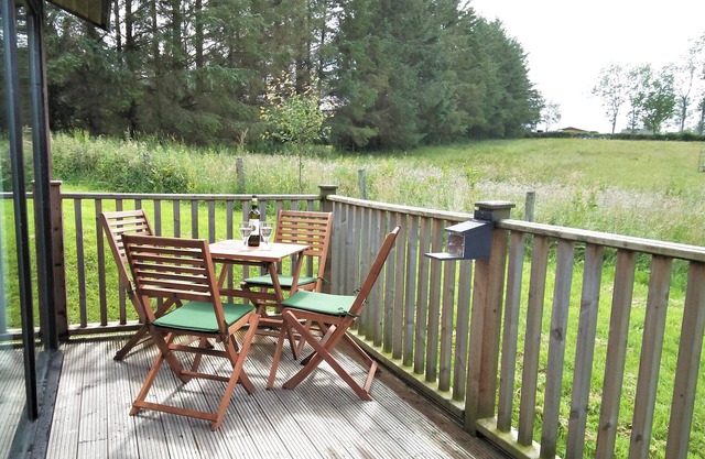 Lake District lodge near Greystoke with wood burner and views toward Blencathra.