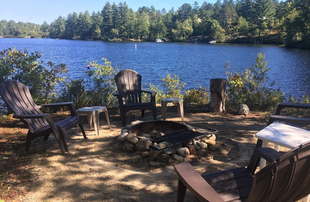 Lake Ossipee New Hampshire waterfront cabin with beach, dock, fire pit, privacy.