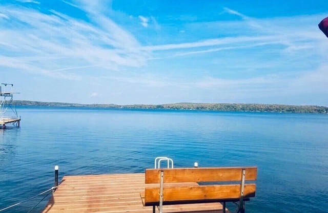 Lake Pokegama recreational cabin with private sandy beach and diving platform.