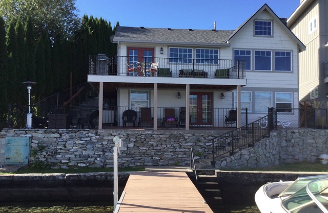 Lakefront Cottage on South Shore with private dock + boat lift + buoy.