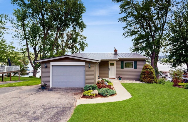 Lakefront house with private dock + near restaurants with live music
