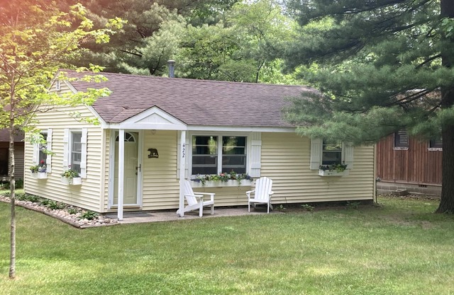 Lakeview! 2 block walk to township beach, park and dock! Clean