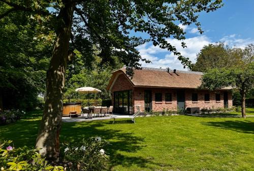 Landhuisje ter Heide - charming cottage with hottub