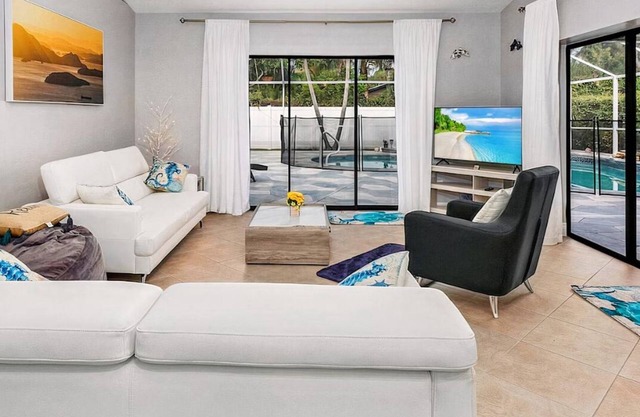 Larg heated pool, 3 bdrm, 2 bath, fast wi-fi, ps3, 4 smart TVs, large lanai with 2 covered areas.