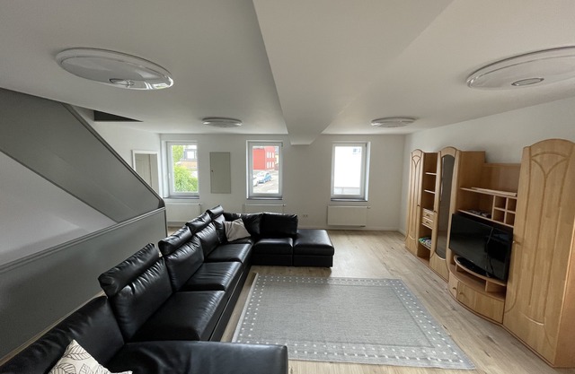 Large apartment with its own entrance in a 2-family house right next to the nature reserve