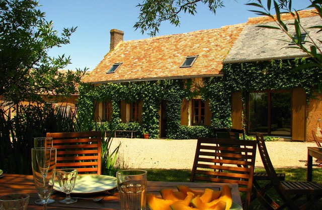 Large, comfortable, quiet farmhouse with heated swimming pool and large wooded garden