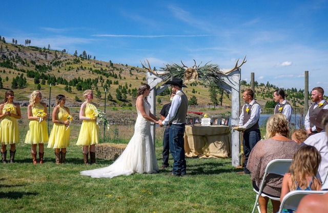 Large log building in the country near a creek