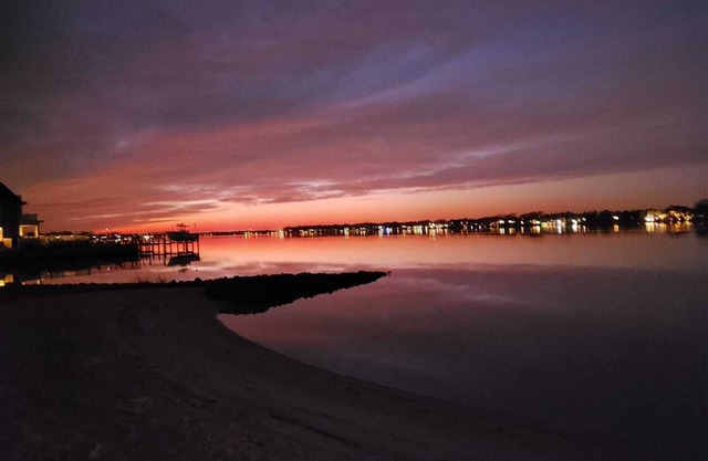 Large waterfront home with dock close to beaches with game room