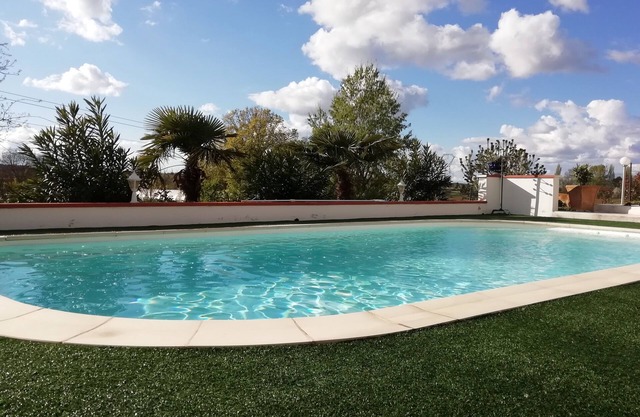 Le Gite du Moulin with its swimming pool, private spa and pétanque court.