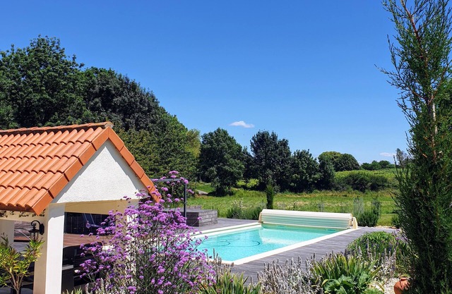 Le Petit Pas Gite in a tranquil setting surrounded by vineyards and sunflowers
