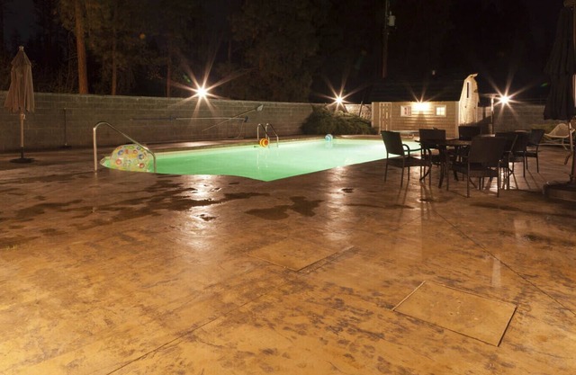 Licensed Kelowna Retreat with pool and pickleball, private midtown acreage