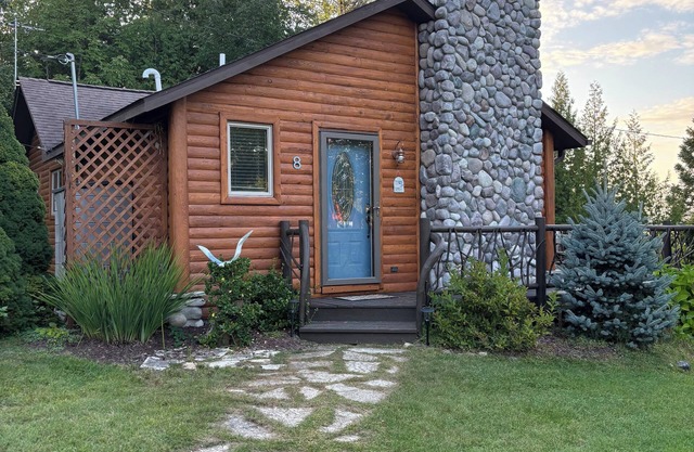 Log Cabin on a Canal of the Indian River between Burt and Mullet Lake