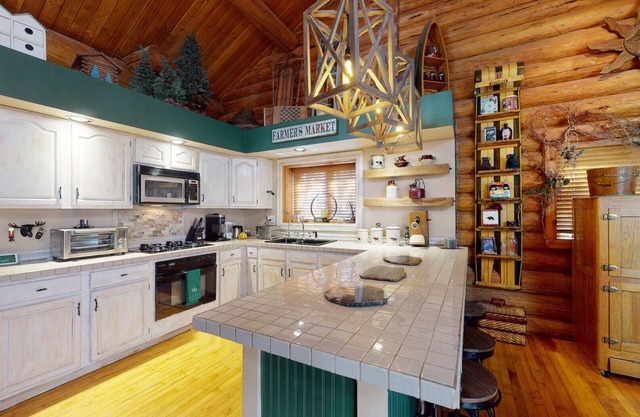 Log Cabin with HGTV Style Backyard INCREDIBLE property