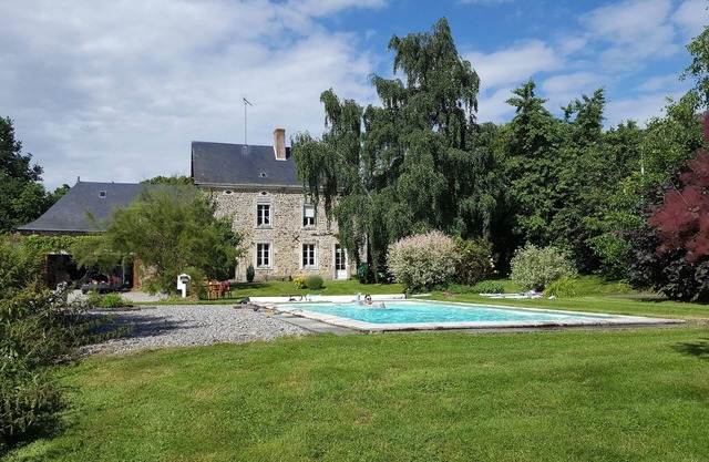 Lovely 9 bedroom house sleeping 18 with private pool in a tranquil setting.