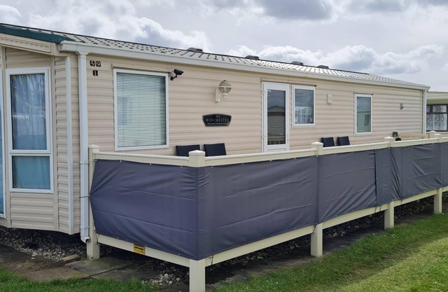 Lovely caravan with decking at Coral Beach Park in Lincolnshire ref 77001CB
