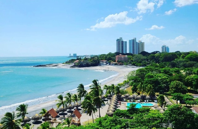 Lovely condo with beach, mountain and pool view.