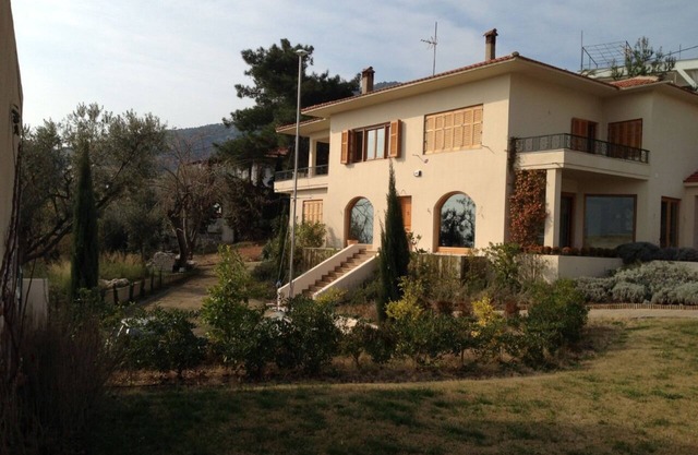 Luxurious Villa, designer's pool, lighted tennis court, olive grove, sea views.