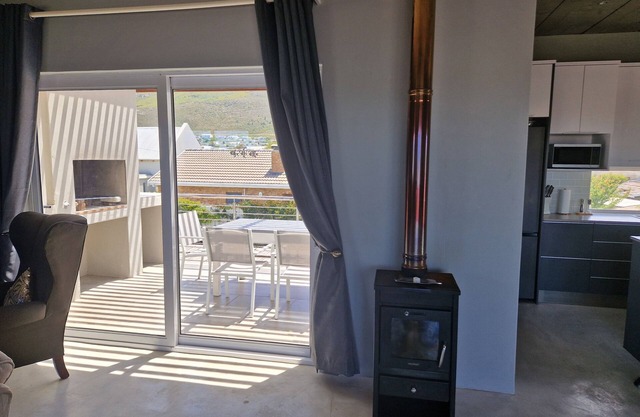 Luxury 2 Bed apartment boasting a rooftop terrace, with mountain & sea views.