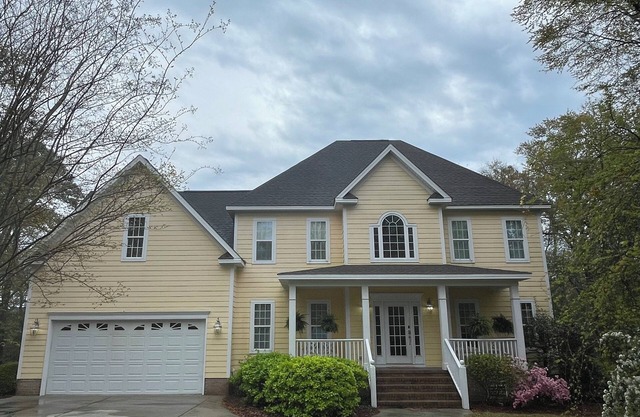Luxury 5-bedroom house in Cedar Point with AC, WiFi, hotub, private yard & more!
