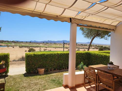 Luxury Ground Floor Apartment at Golf Resort Condado de Alhama with Private Garden & Pools