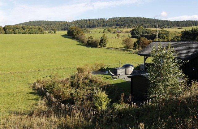 Luxury lodge near Winterberg with hot tub with a beautiful view