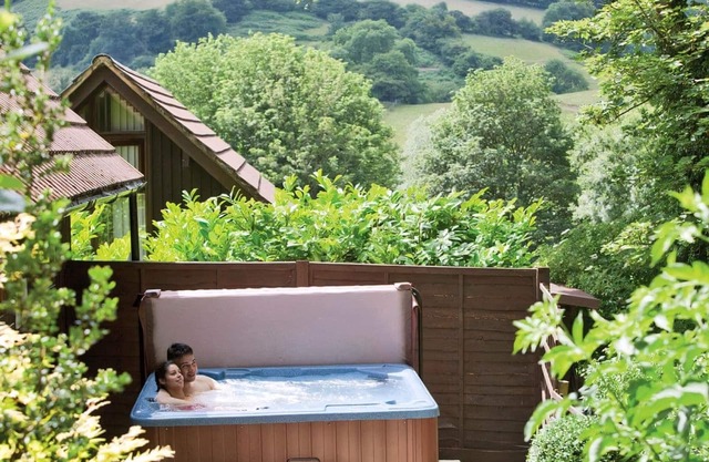 Luxury lodge residing at the top of the wooded valley.