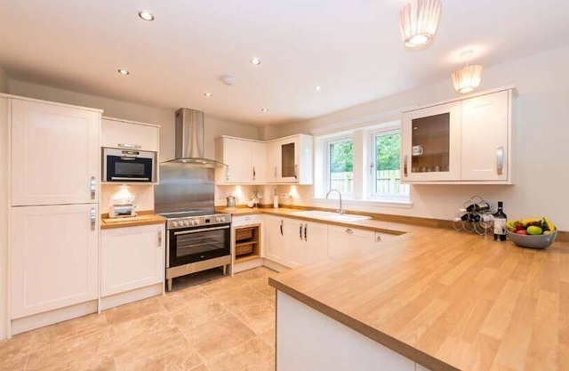 Luxury lodge, set in 40 acres of beautiful private gardens at Carberry Tower Estate.