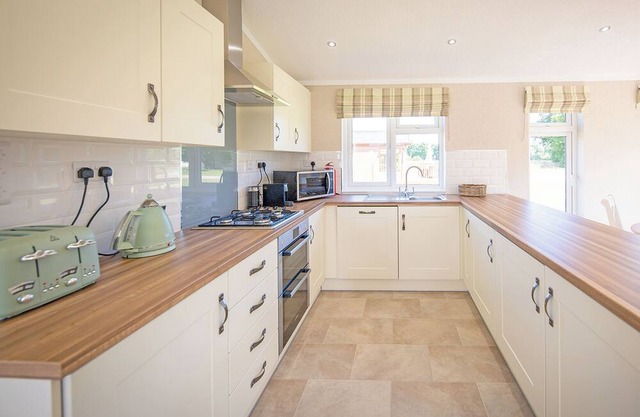 Luxury lodge with one double with freestanding bath.