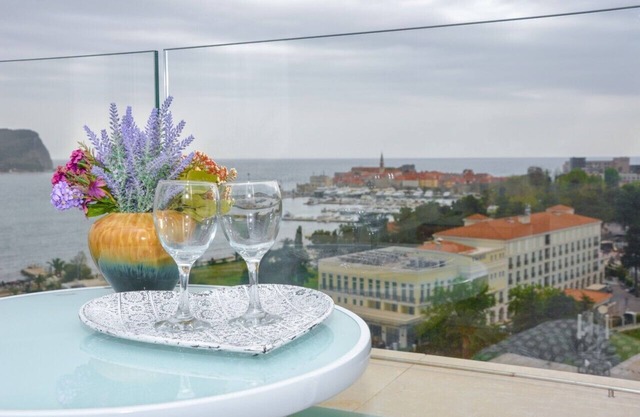 Luxury private apartments in hotel building with beautiful sea view and Old town