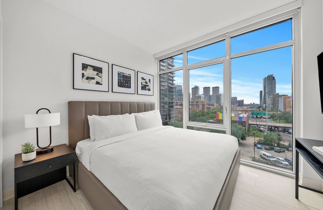 Luxury West Loop Stay: Modern Suites w/Balcony, Resort Amenities & City Views