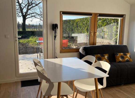 Maisonnette avec parking privé et local à velos