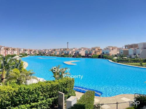 Marassi Luxurious 2 bedrooms Direct Lagoon -Steps to the Beach ,El Alamein hotel& Marina