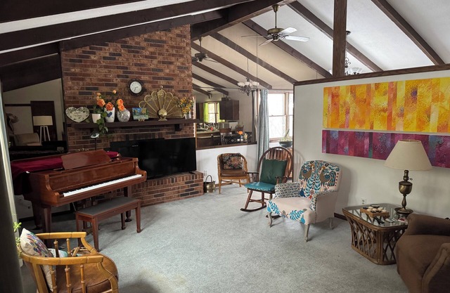Mid-century Modern Home with Large Deck and Cozy Living Area
