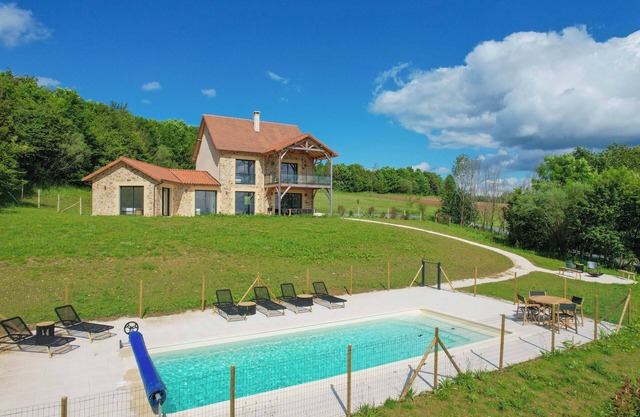 Modern vacation home with private pool on estate with golf. Pets allowed!