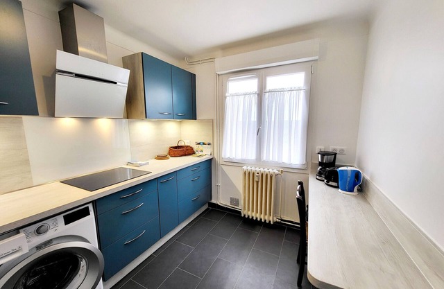 Modern 1-Bed Apartment with Parking in Charming La Chaume, Close to Beach & Market