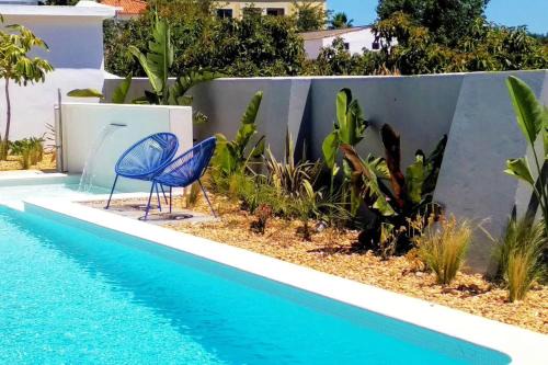 Modern apartment in Estói with shared pool.
