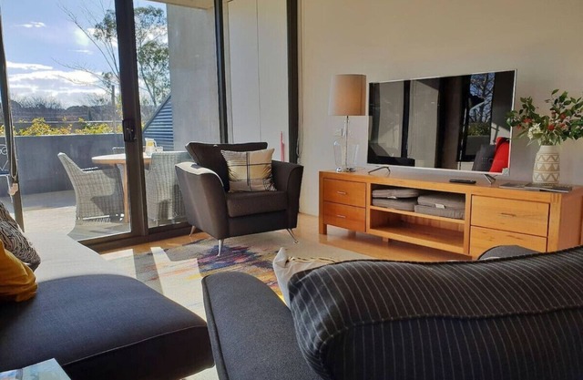 Modern Apartment - Prime Location with Heated Pool