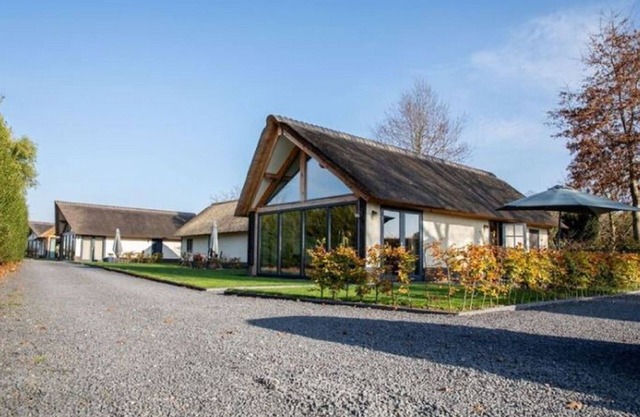 Modern cottage surrounded by nature