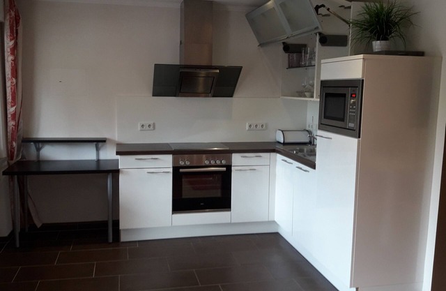 Modern, high-quality furnished 2-room apartment with balcony on the Moselle!