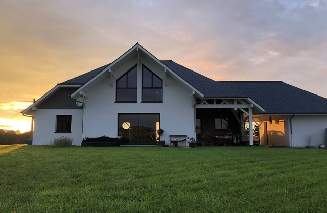 Modern house in the countryside between sea and mountains