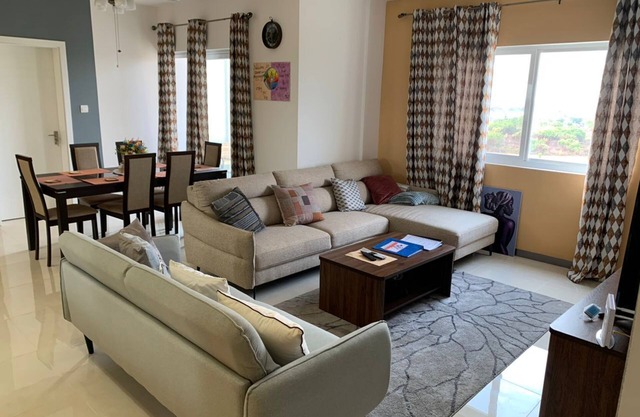 Modern luxurious 3-bedroom apartment, with views out to the ocean.