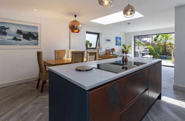 Modern rear extension with open plan living and brand new backyard sauna.
