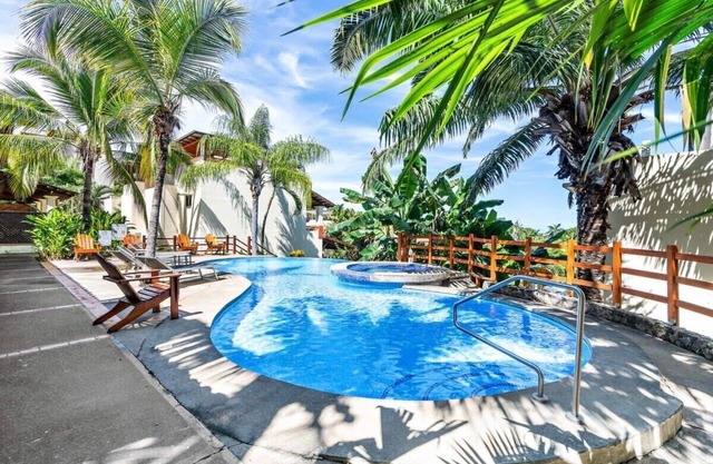 Modern Split-Level 2-Bedroom Condo with Pools, Terrace & Easy Beach Access