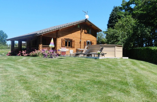 Modern wooden chalet with heated pool jacuzzi spa and sauna