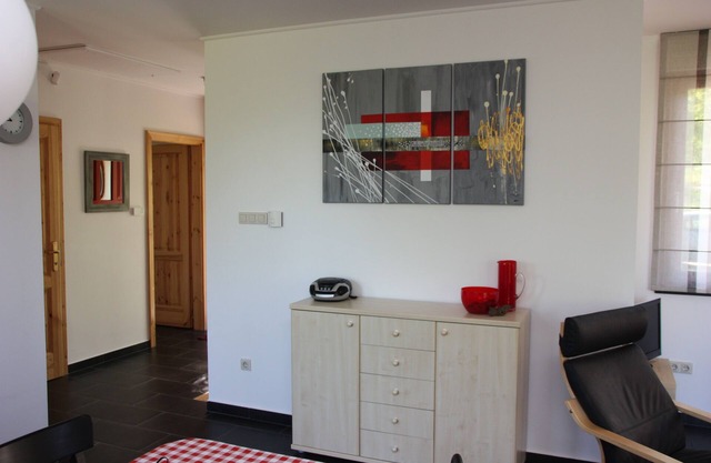 Modernly furnished, detached basement villa with spacious garden. Three bedrooms, two bathrooms.