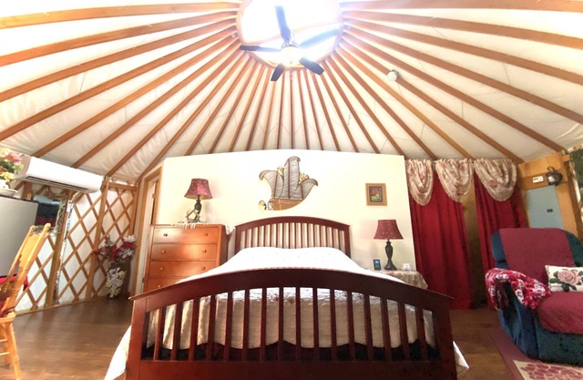 Mystical Rose is a whimsical flower themed & fully furnished Yurt.
