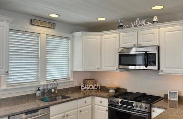 Nestled one block from the bay, and a short walk to the beach.