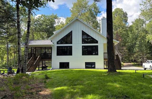 New 3-bedroom house on Spider Lake and Turtle River on a private 3 acre lot.