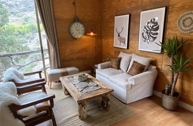 Ñilhue house with forest and river